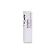 White tube of Caudalie lip conditioner with text on side.