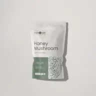 Honey Mushroom supplement pouch, 100g powder, gluten-free, with mushroom illustration.