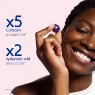 Smiling person holding a purple capsule. Text: x5 collagen, x2 hyaluronic acid production.