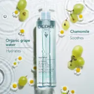 Caudalie Vinoclean Micellar Cleansing Water with grapes and chamomile flowers.