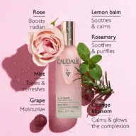 Caudalie Beauty Elixir bottle with rose, mint, grape, lemon balm, rosemary, and orange blossom.