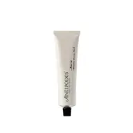 Antipodes Aura Manuka Honey Mask tube with black cap on white background.