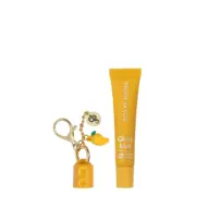 Yellow tube of Eco by Sonya Glory Lips balm with mango keychain.