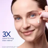 Woman applying cream to cheek, text: "3X more firming than retinol".