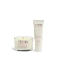 Candle and body butter by Neom, labelled "Real Luxury" with lavender, jasmine, sandalwood.