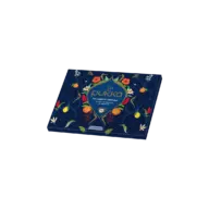 Pukka tea advent calendar box with floral and fruit design on a dark background.
