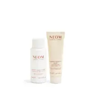 Neom bath milk and body butter tubes, 50ml and 30ml, on white background.