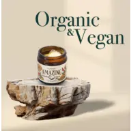 Jar of Napiers Amazing Cream on stone slab, text "Organic & Vegan" in background.