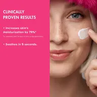 Woman applying cream to cheek, text: "Clinically proven results, increases skin's moisturisation by 79%".