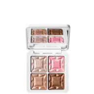 Makeup palette with four shades: pink, light brown, dark brown, and bronze. "rms beauty" embossed.