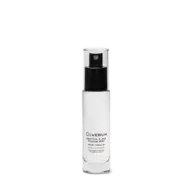 Clear bottle of Olverum Restful Sleep Pillow Mist with black spray top.