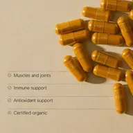 Yellow capsules on beige background with text: Muscles and joints, Immune support, Antioxidant support.