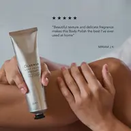 Hands applying Olverum Body Polish with a five-star review and testimonial text.