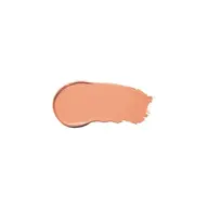 Peach-coloured cream swatch on white background.