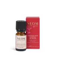 Essential oil bottle and red box, labelled "NEOM Christmas Wish Essential Oil Blend".
