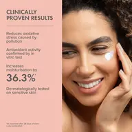 Smiling person applies cream to cheek. Text: Clinically proven results, increases moisturisation by 36.3%.