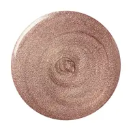 Shimmery bronze cream in a circular swirl pattern.