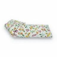 Floral-patterned fabric eye pillow with yellow, red, and blue flowers.