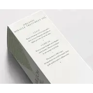 Box of Organic Miracle Treatment Oil with usage instructions in English and Dutch.