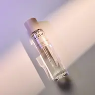 NEOM Perfect Night's Sleep Mist bottle on a light surface.