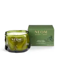 Green NEOM candle and box, labelled "Perfect Peace Scented Candle".