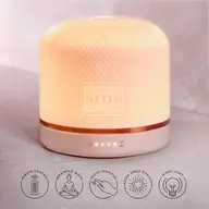 NEOM diffuser with textured surface, remote control, breathing mode, touch sensitive, night light.