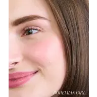 Close-up of a woman's face with smooth skin and text "Bohemian Girl" in the corner.