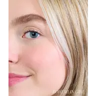 Close-up of a woman's face with blonde hair and blue eyes. Text: "BOHEMIAN GIRL".
