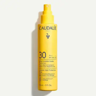 Yellow bottle of Caudalie SPF 30 spray, 150 mL, with UVA/UVB protection.
