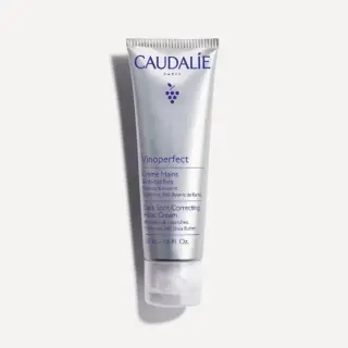 Caudalie Vinoperfect hand cream tube, 50ml, for dark spot correction.