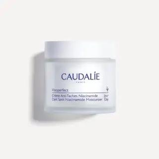 Caudalie Vinoperfect Dark Spot Niacinamide Moisturiser jar on white background.