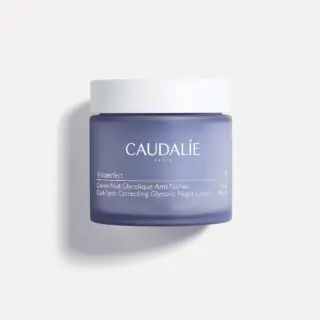 Caudalie Vinoperfect Dark Spot Correcting Glycolic Night Cream in a purple jar.