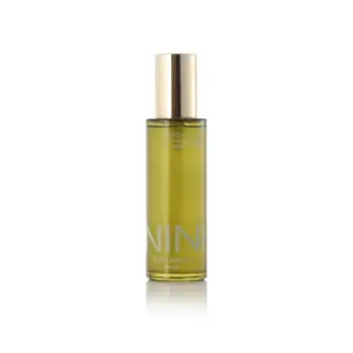 NINI Organics Detox Foam in a clear bottle with a gold cap, 100ml.