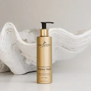 Eco by Sonya Winter Skin moisturiser bottle on white textured background.