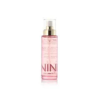Pink spray bottle with gold cap, labelled "NINI Organics".