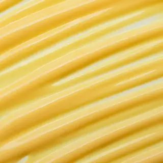 Yellow cream with smooth, wavy texture.