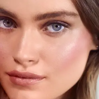Close-up of a woman's face with natural makeup. Text: "HANKY PANKY" in the corner.
