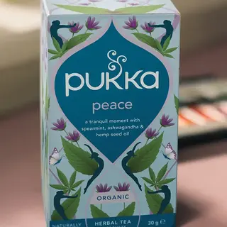Pukka Peace herbal tea box with floral design, 20 sachets, organic.