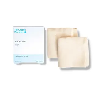 Two muslin cloths with packaging from The Organic Pharmacy.