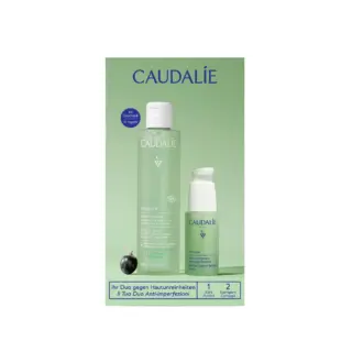 Caudalie Vinopure Purifying Toner and Serum on green background with product text.