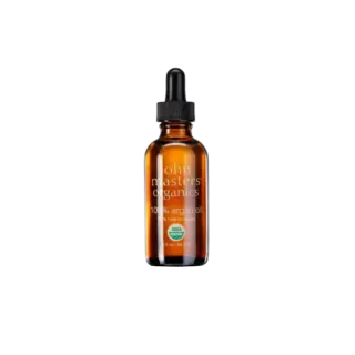Brown glass bottle with dropper, labelled "John Masters Organics 100% argan oil".