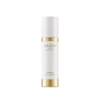 White bottle of Abloom Organic Day Cream with gold accents.