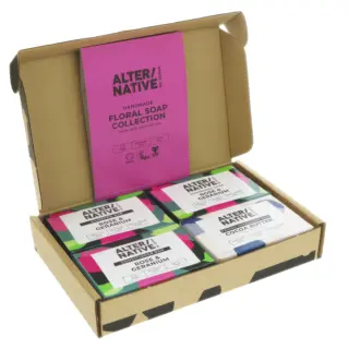 Open box with four bars of soap labelled "Rose & Geranium" and "Cocoa Butter".