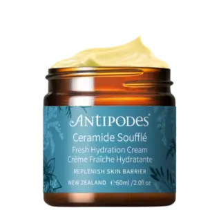 Antipodes Ceramide Soufflé cream jar, 60ml, with yellow cream on top.