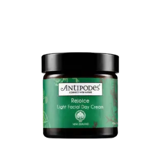 Antipodes Rejoice Light Facial Day Cream jar with green label.