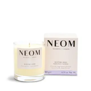 NEOM Bedtime Hero candle, chamomile, ylang ylang, cedarwood, 185g, next to its box.