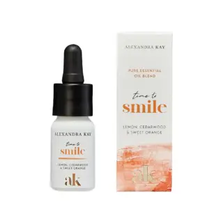 Essential oil bottle and box, "time to smile", lemon, cedarwood, sweet orange.