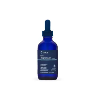 Blue bottle of Trace Ionic Magnesium Chloride liquid supplement with dropper.