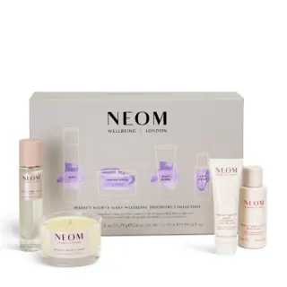 NEOM Wellbeing Discovery Collection with mist, candle, body butter, bath foam, and packaging.