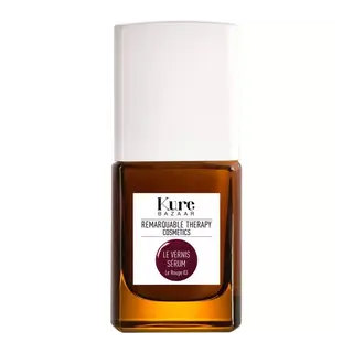 Kure Bazaar Le Vernis Sérum bottle with white cap and brown glass.